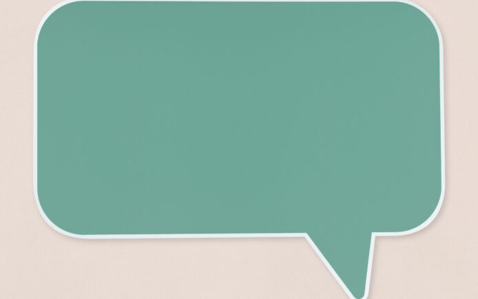 Green speech bubble icon isolated